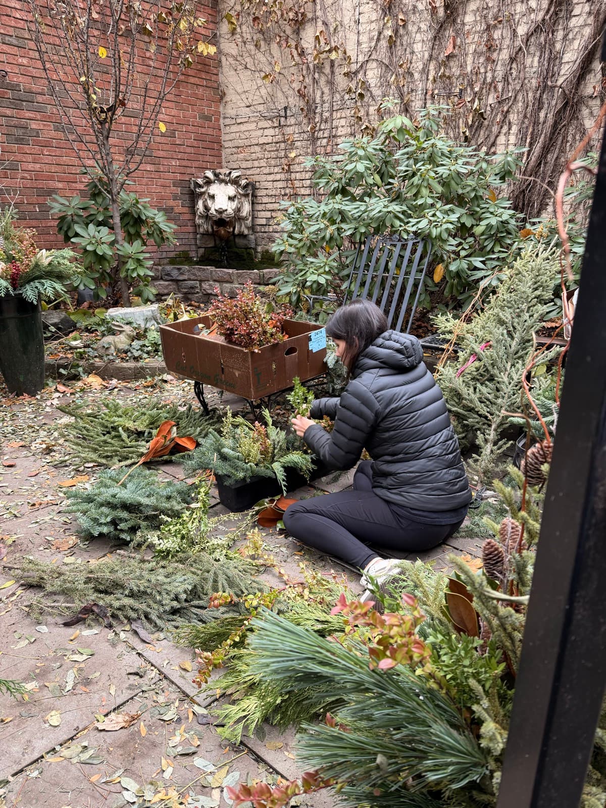 Sibel at work creating holiday arrangements